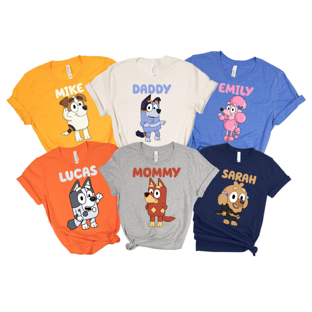 a group of shirts with cartoon characters on them